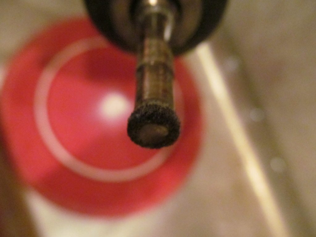 photo shows a close up of the special drill tip that is needed to drill a hole through a glass or ceramic plate