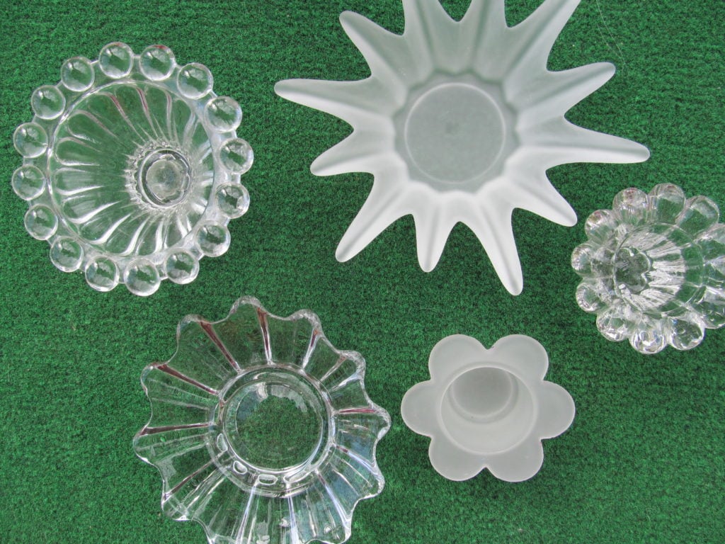 plate flowers 5 small glass pieces used for votive candles have very different shapes and are good choices for the center of a plate flower