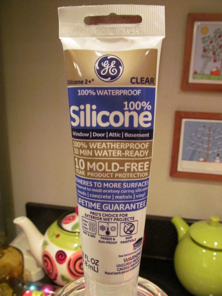 close up photo of a tube of silicone sealant or "glue" for securing the pieces together