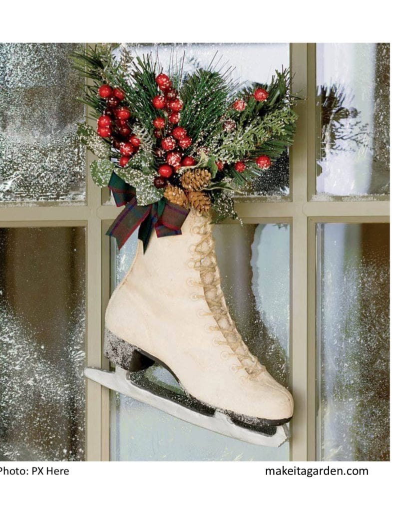 Decorate your porch for Christmas, photo of a woman's figure skate filled with holiday greenery used as decor