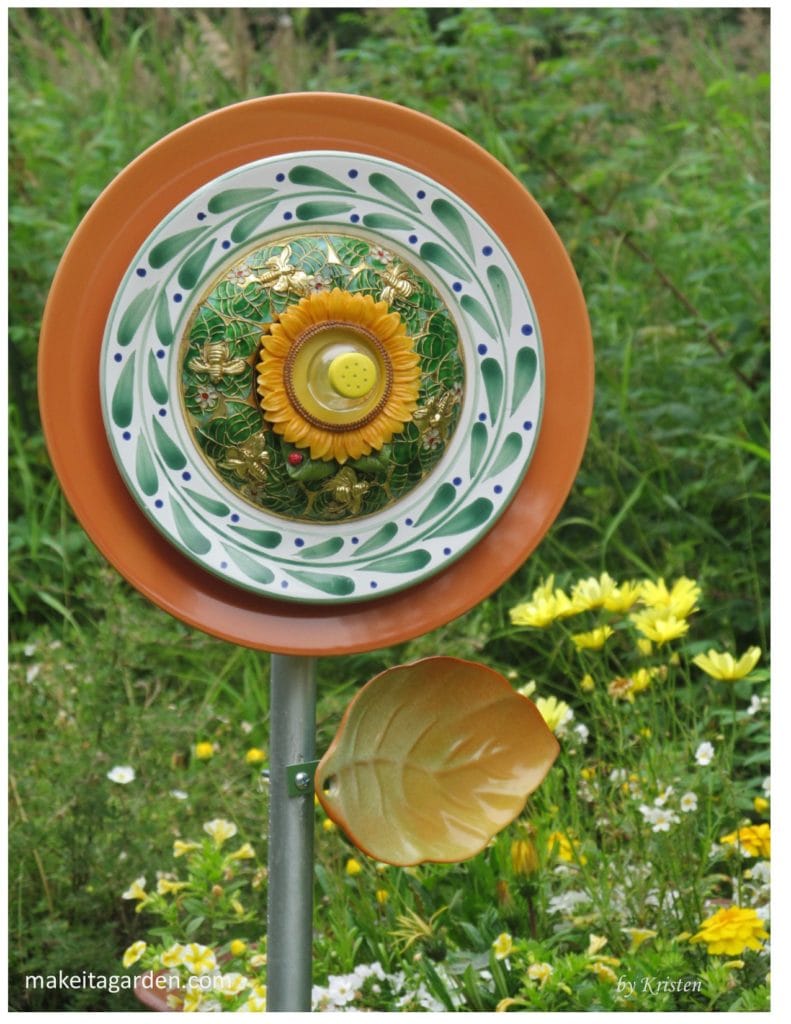 dish flower garden art looks like a sunflower with a leaf. Add a leaf to your dish flower