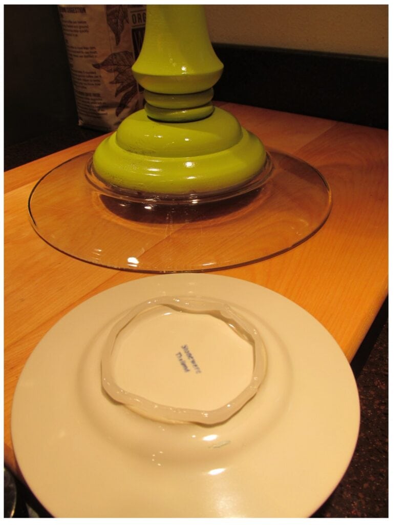 Photo shows silicone "glue" applied to bottom of item used to make base. Re-purpose a glass platter