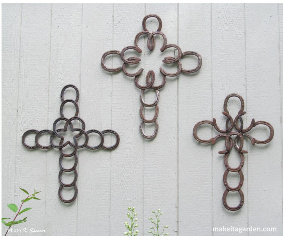 3 crosses made out of real horseshoes. Imaginative sculptures make Palmer garden