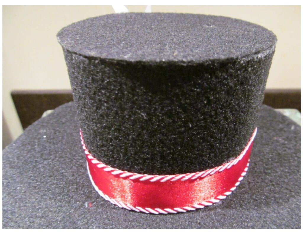 close up of the finished  top hat with the round piece glued for the top glued on.