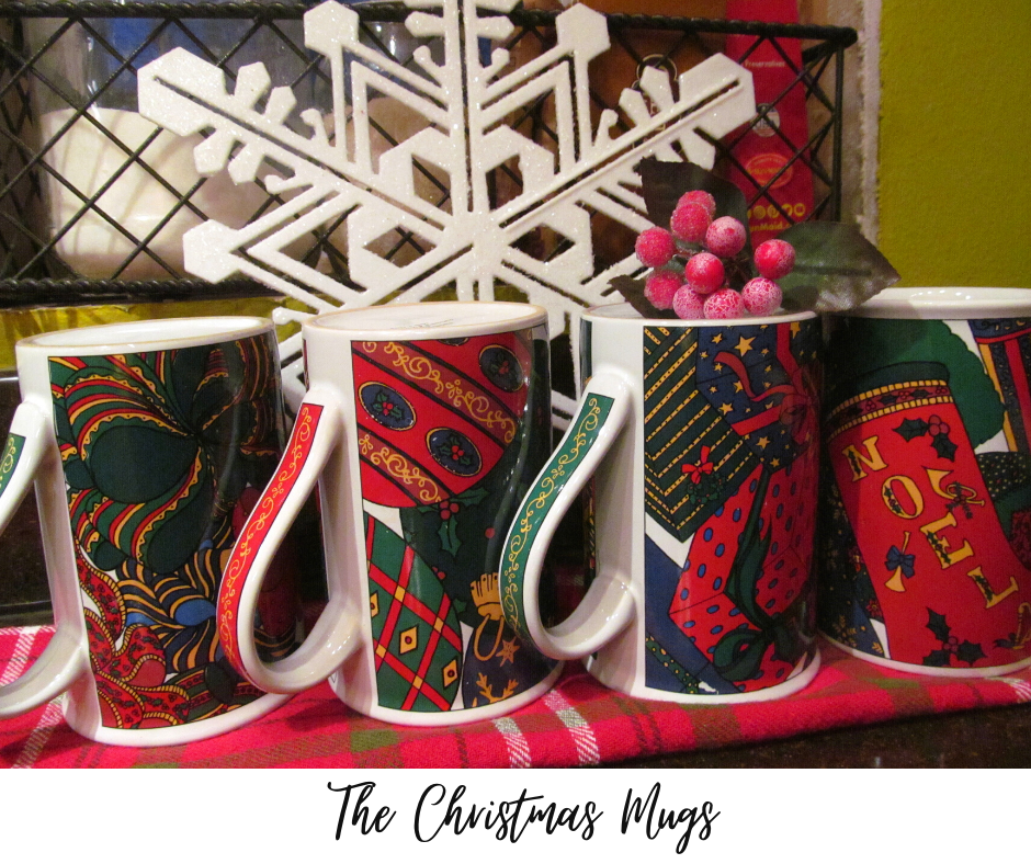 The 4 Christmas coffee mugs all together in a set