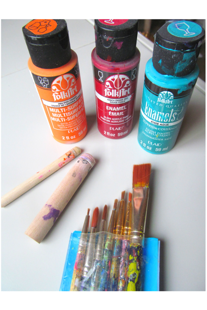 small bottles of craft paint, paint daubers and paint brush set