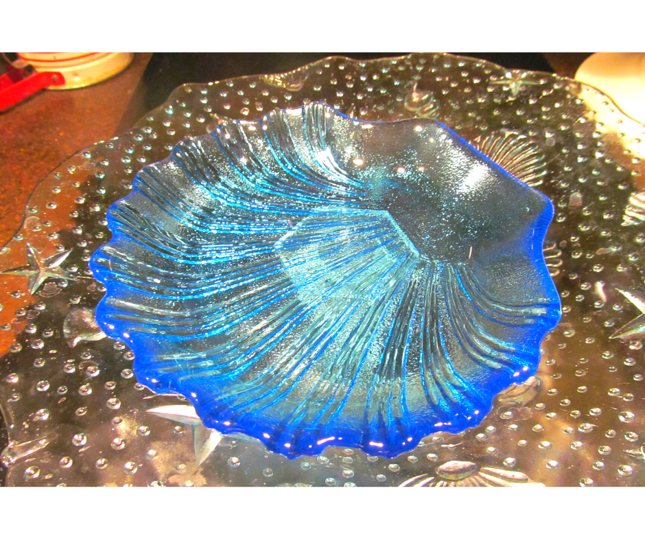blue glass clam shell soap dish used in the little mermaid fountain
